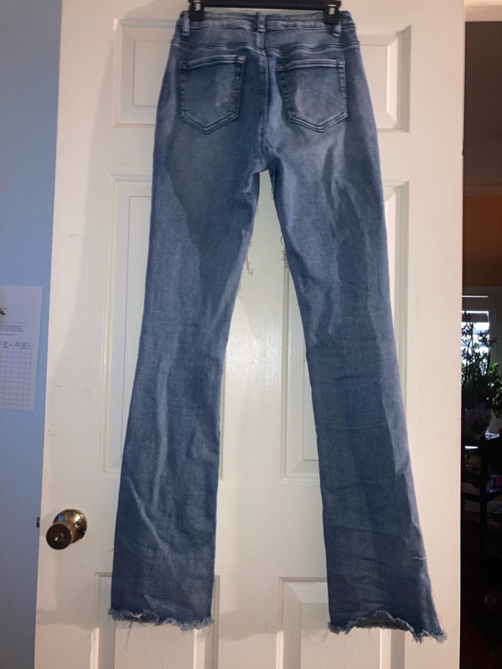 Women's Light Blue Distressed Ripped Flare Jeans - Picture 2 of 3